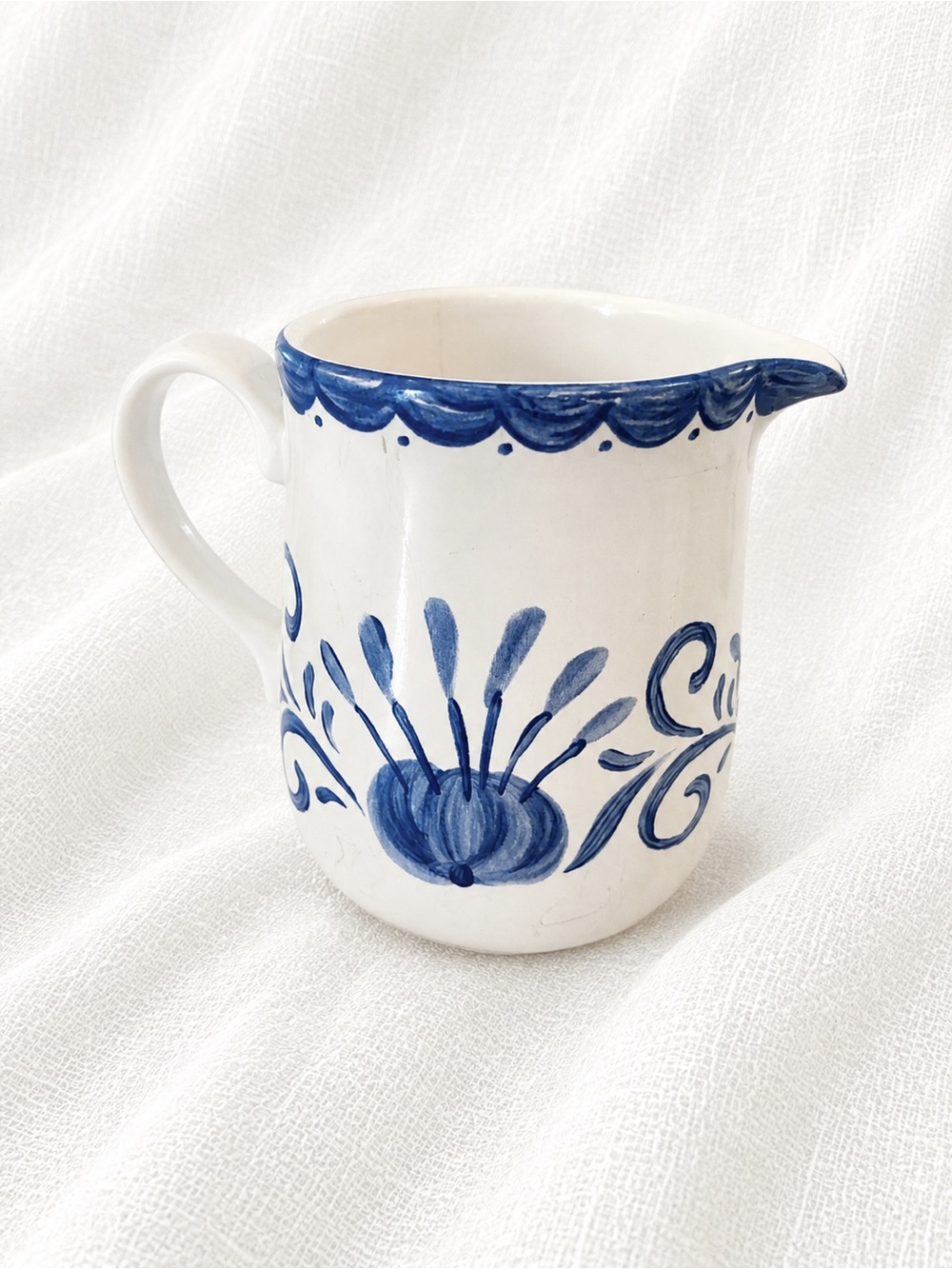 White Ceramic Creamer with Blue Hand-Painted Floral Motif